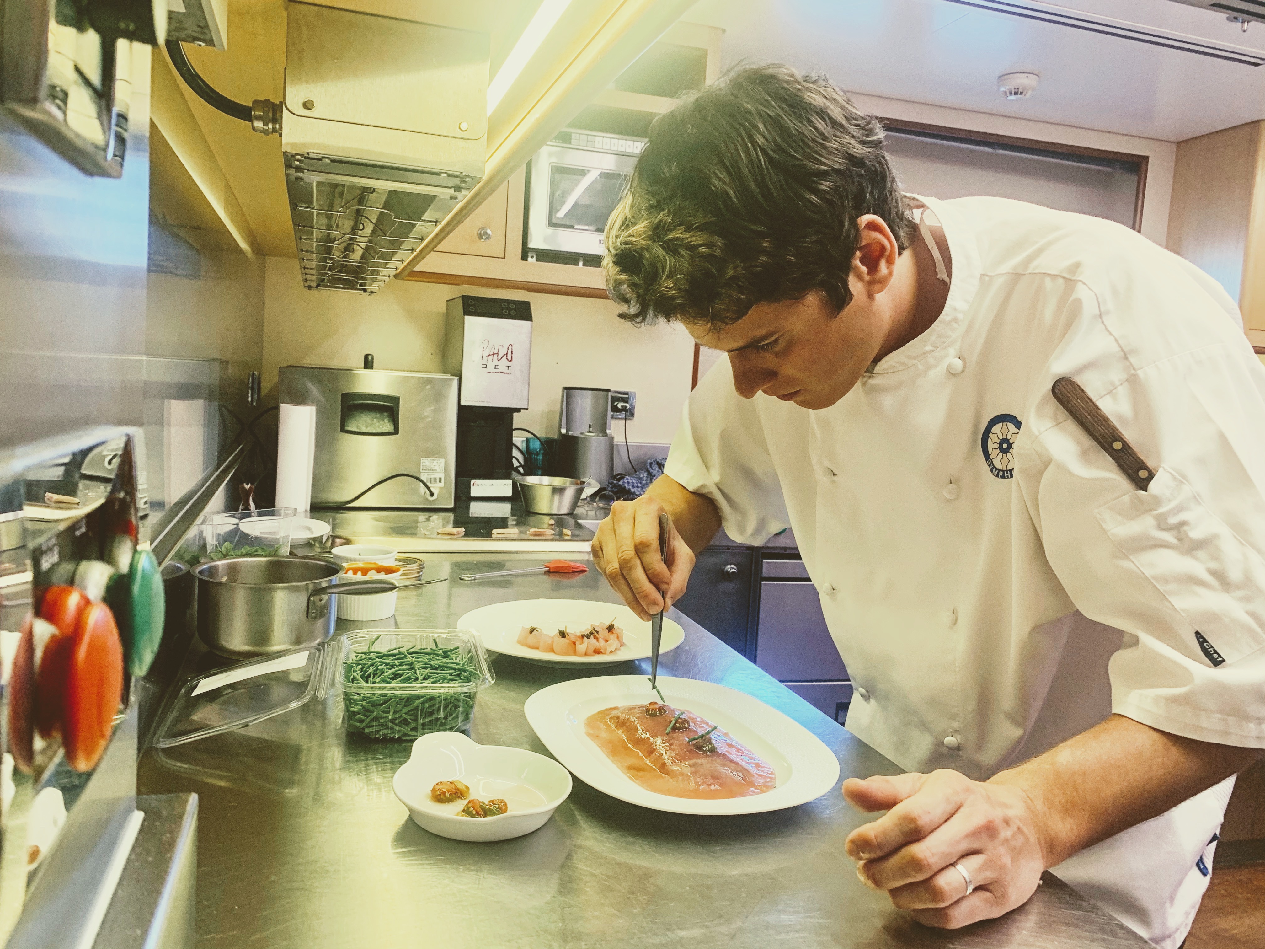 Arnaud Callier plating in a yacht galley